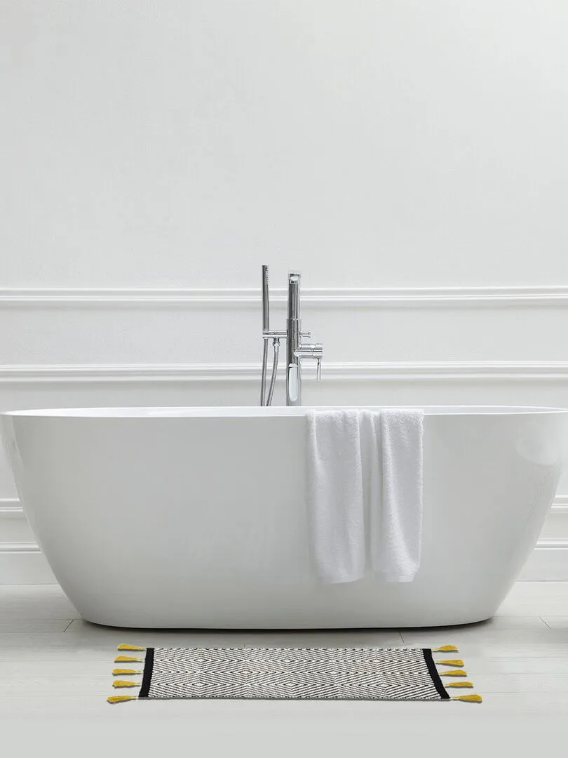 Guy Levasseur - Tapis de bain en coton fantaisie noir à pompons - Noir